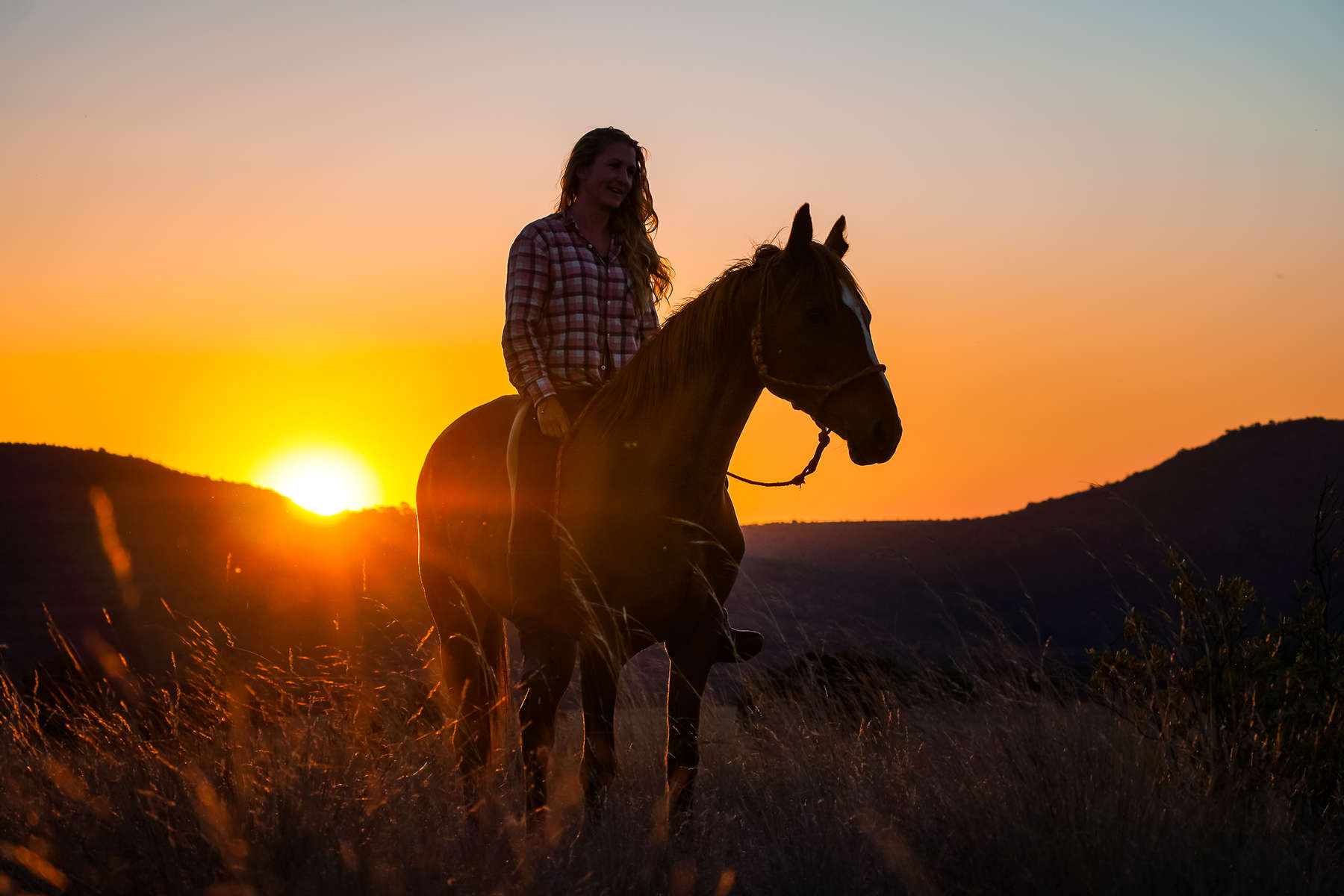 Cavalière au coucher de soleil