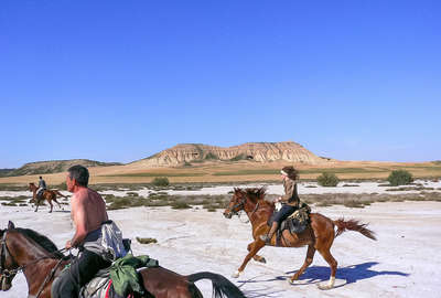 Cavaliers au galop dans la Sierra de Guara