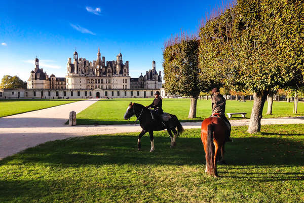 A cheval dans les jardins du château de Chambord